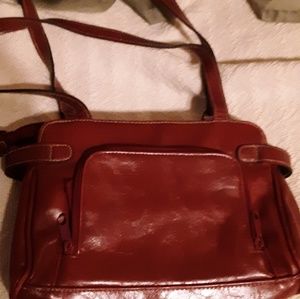 Small red purse, lots of sections to organize.